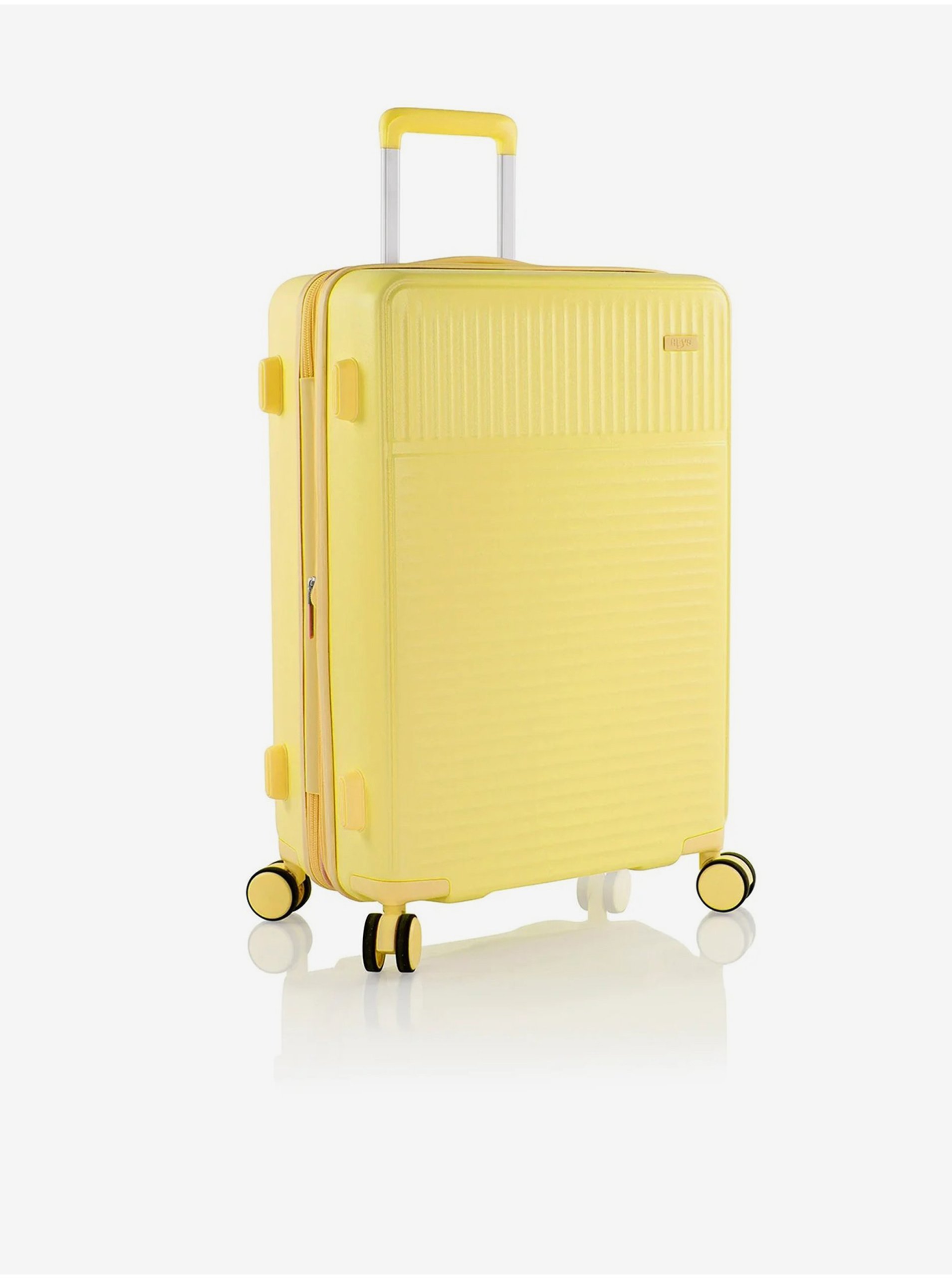 Levně Žlutý cestovní kufr Heys Pastel M