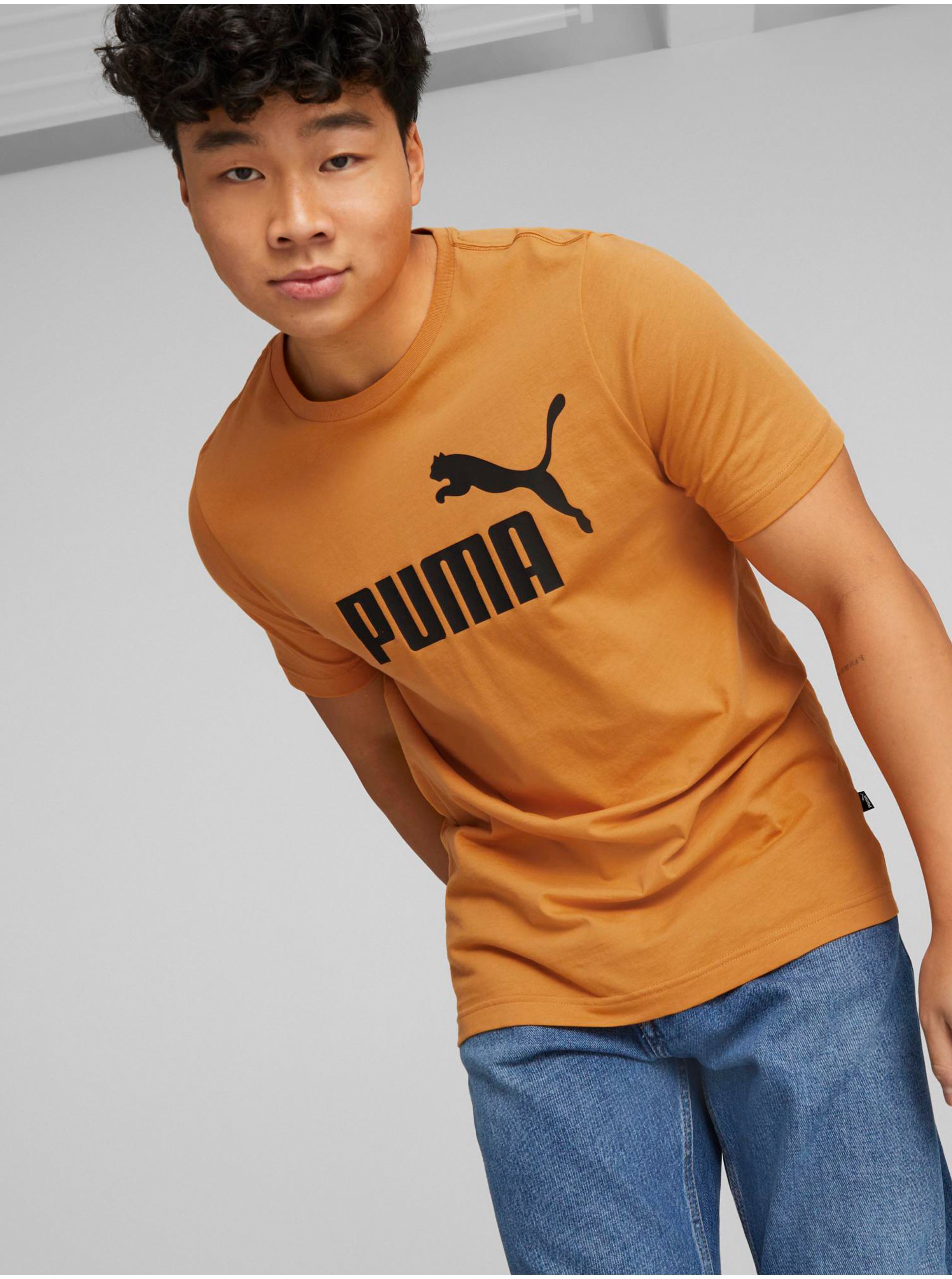 Levně Oranžové pánské tričko Puma