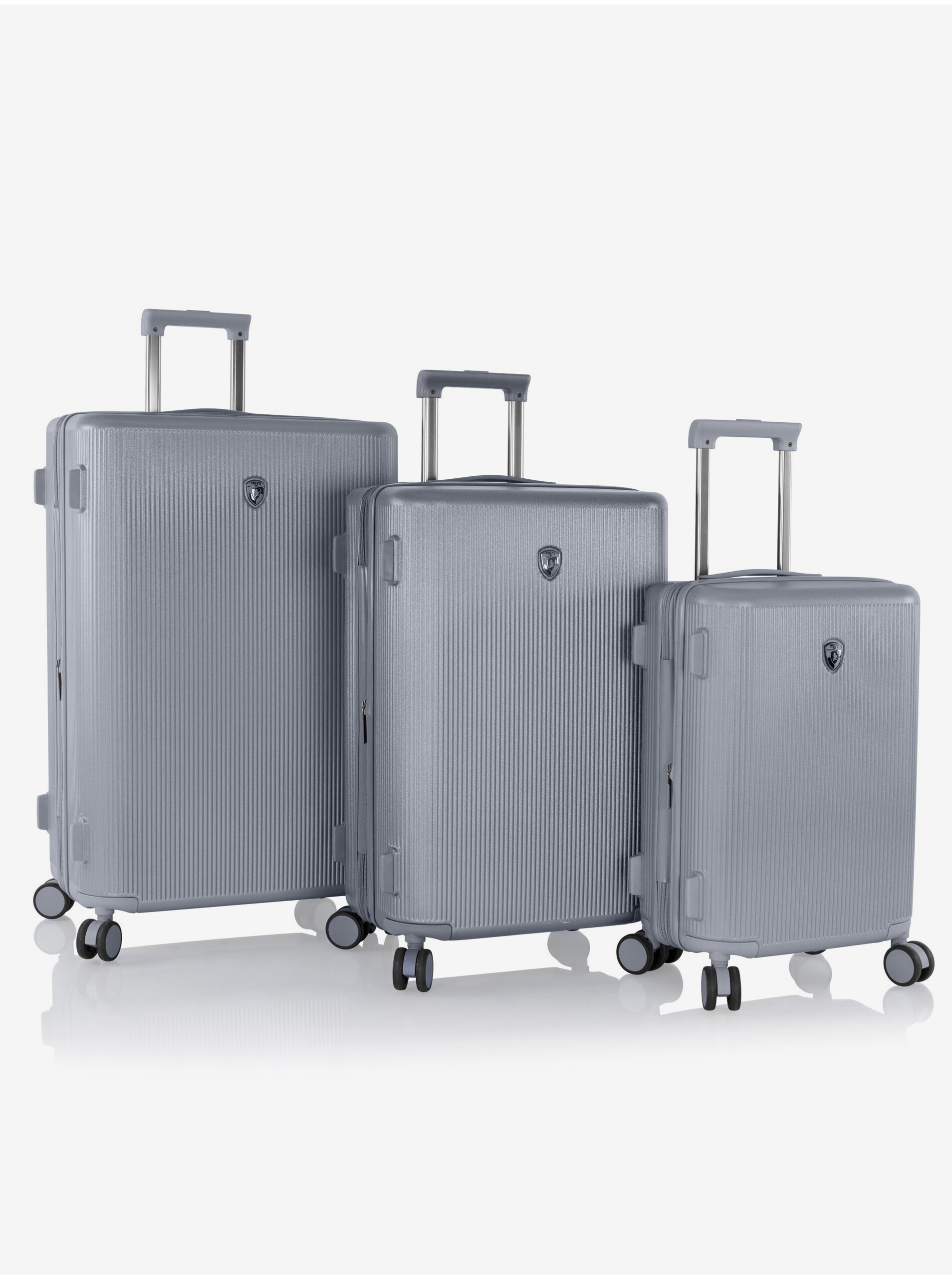 Levně Sada tŕí cestovních kufrů v šedé barvě Heys Earth Tones S,M,L Glacier Grey