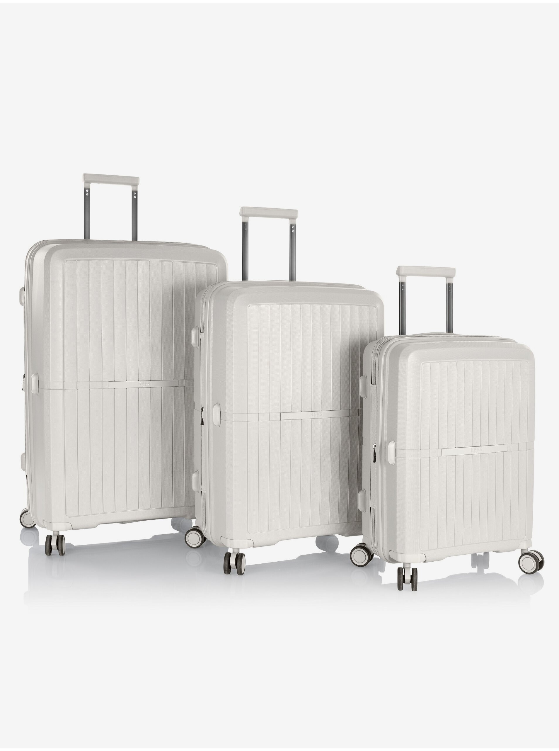 Levně Sada tří cestovních kufrů v bílé barvě Heys Airlite S,M,L