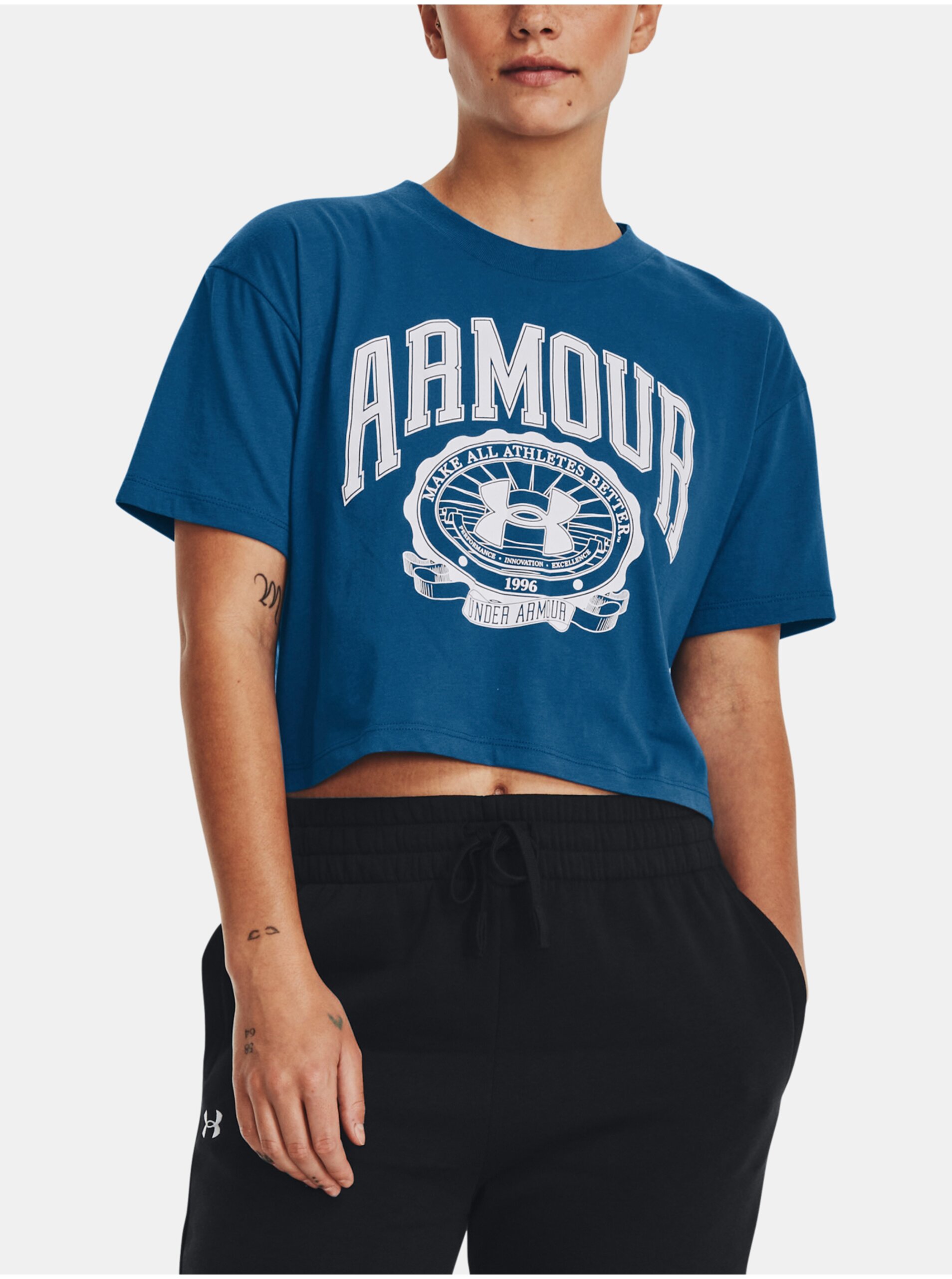 Levně Modré dámské crop top tričko Under Armour Collegiate