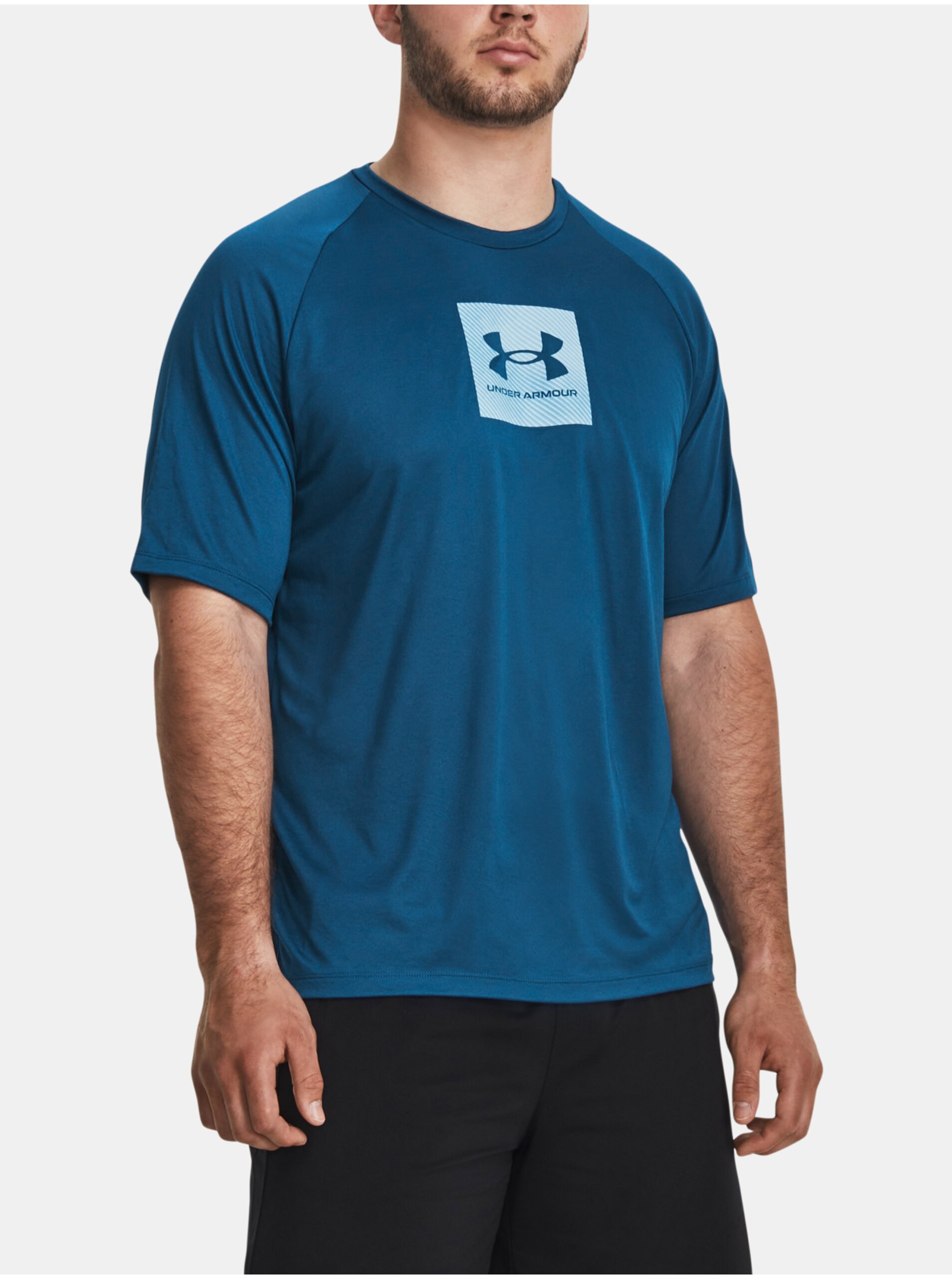 Levně Tmavě modré sportovní tričko Under Armour UA Tech Prt Fill SS