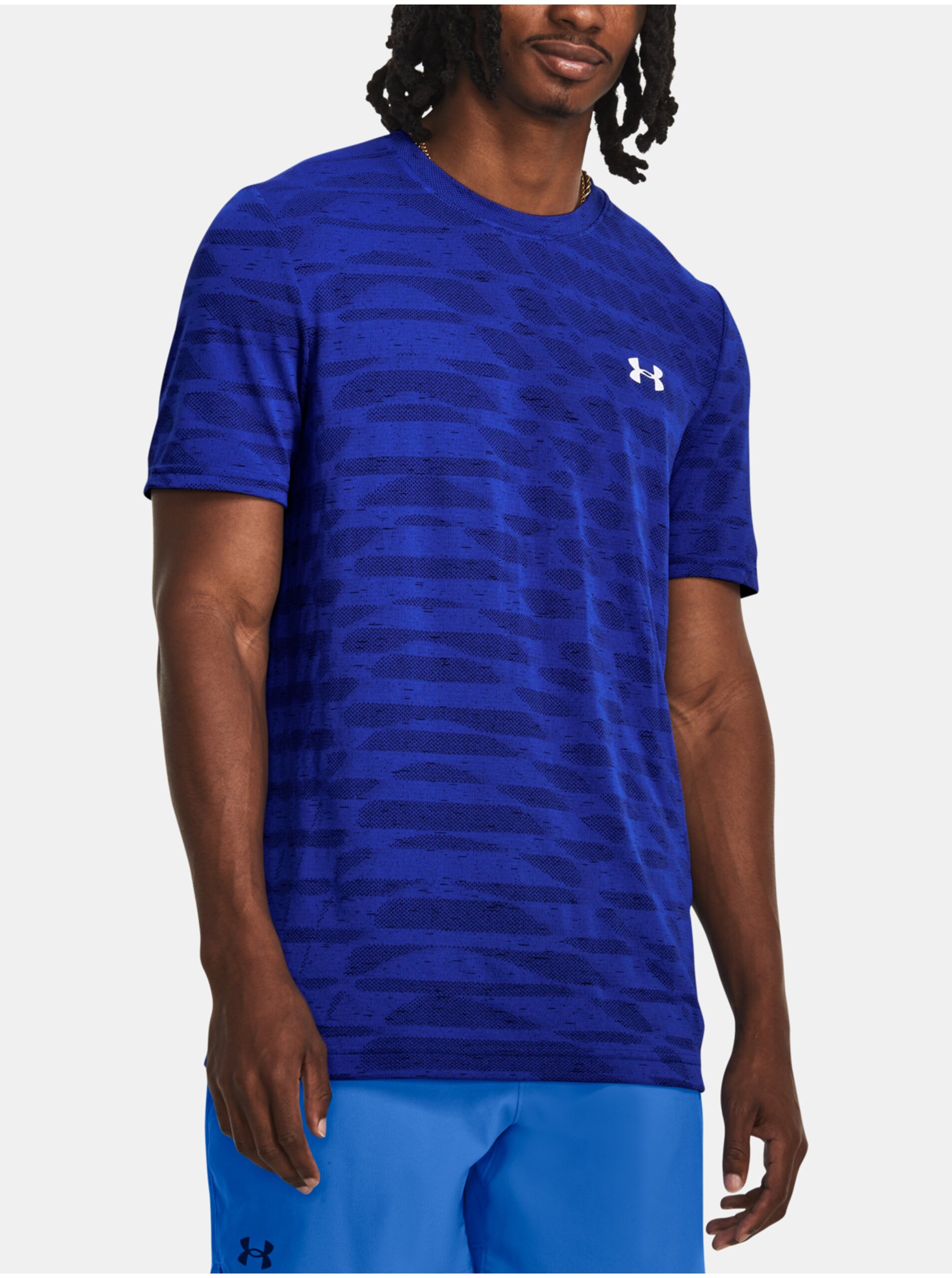Levně Modré sportovní tričko Under Armour UA Seamless Ripple SS