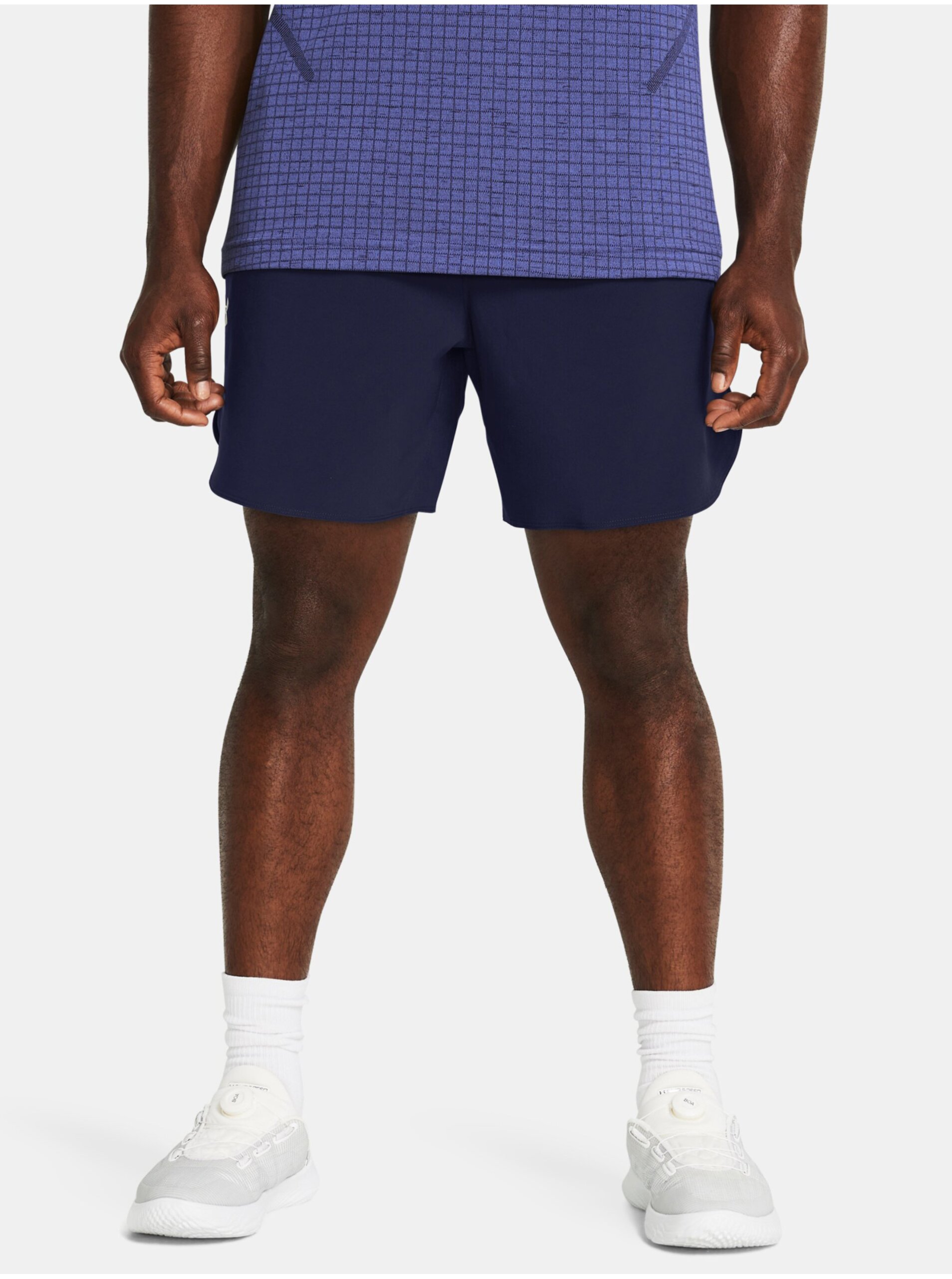 Levně Tmavě modré sportovní kraťasy Under Armour UA Peak Woven Shorts