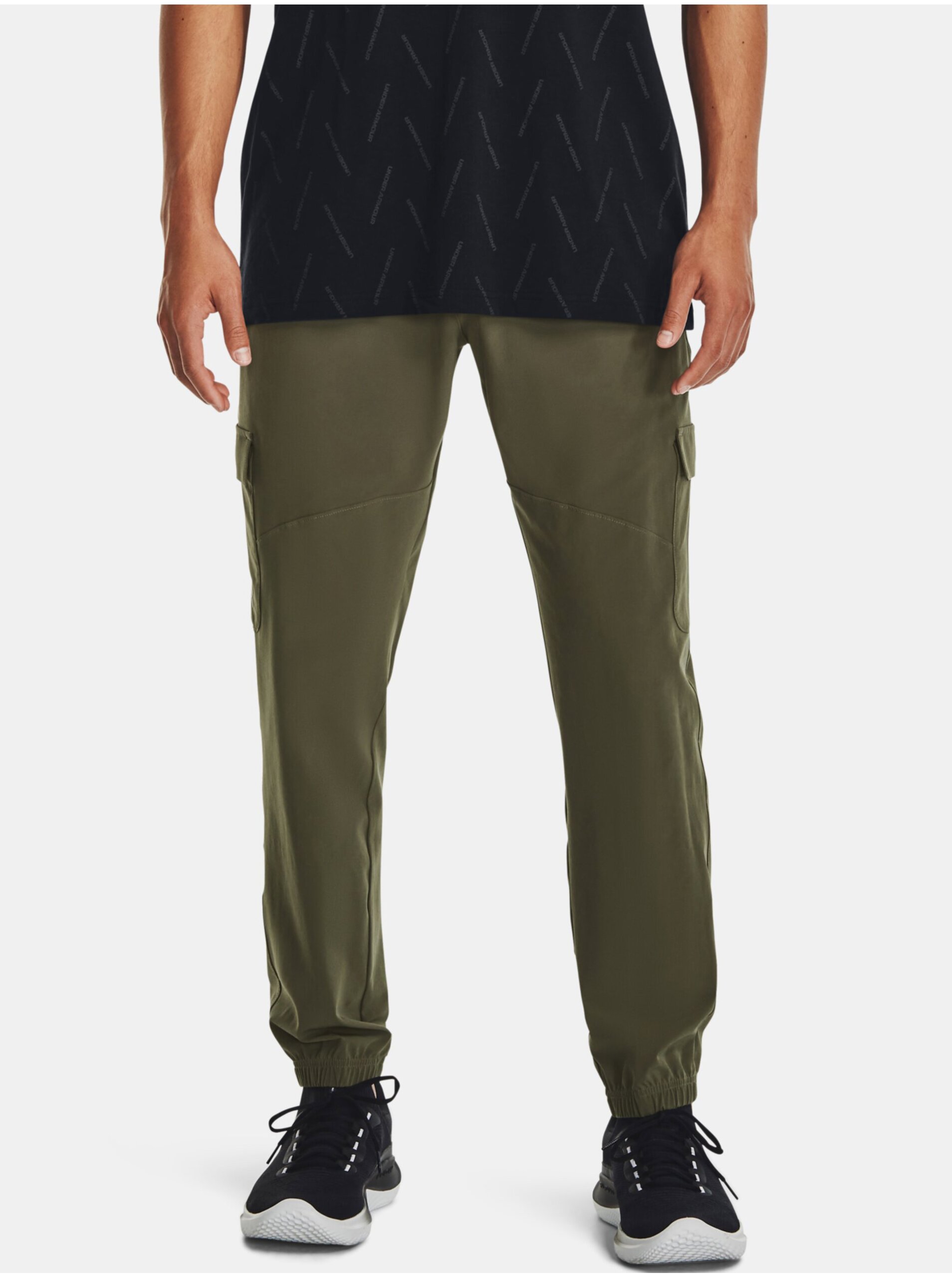 Levně Khaki sportovní kalhoty Under Armour UA Stretch Woven Cargo Pants