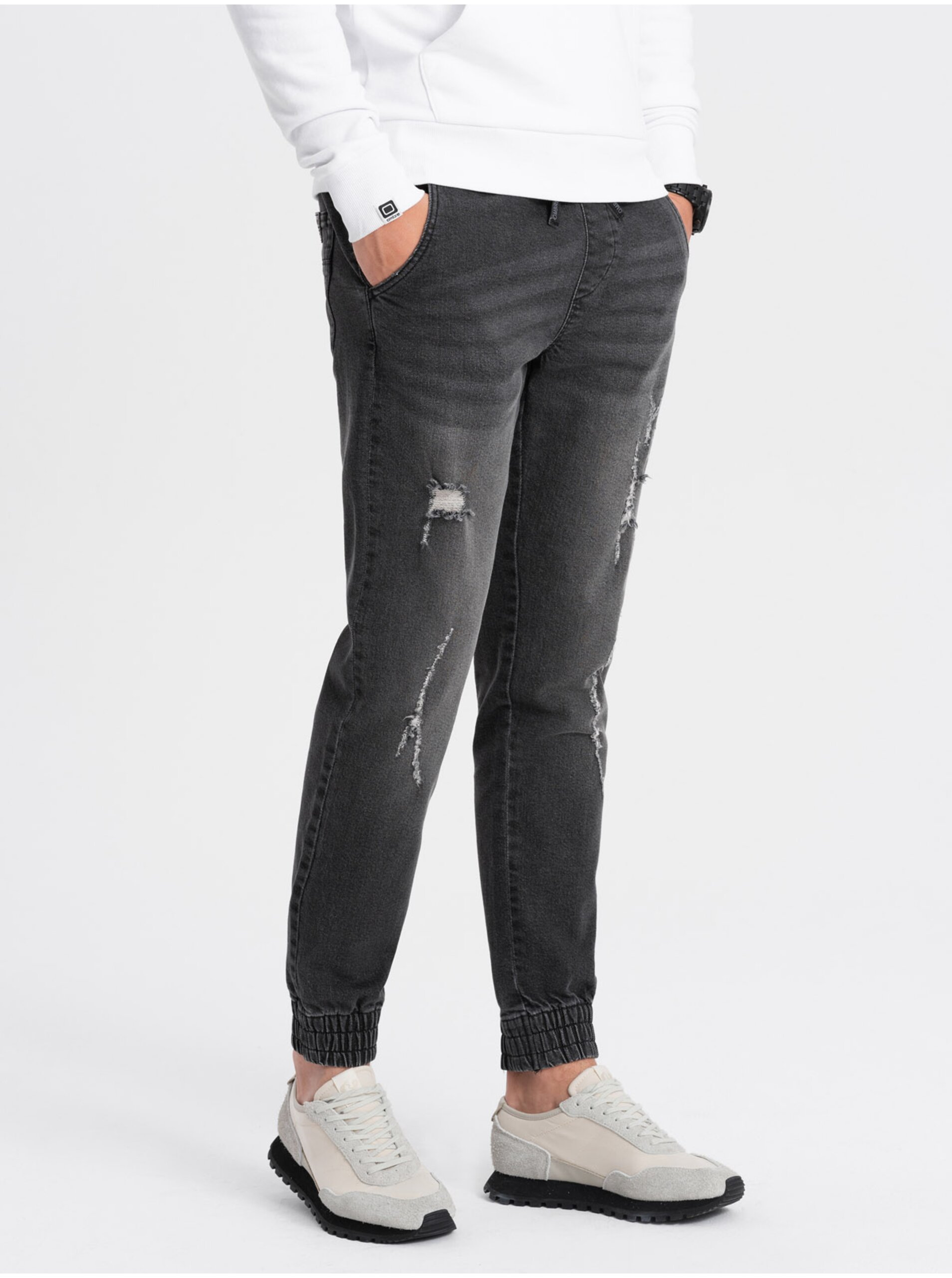 Levně Tmavě šedé pánské džíny s potrhaným efektem Ombre Clothing
