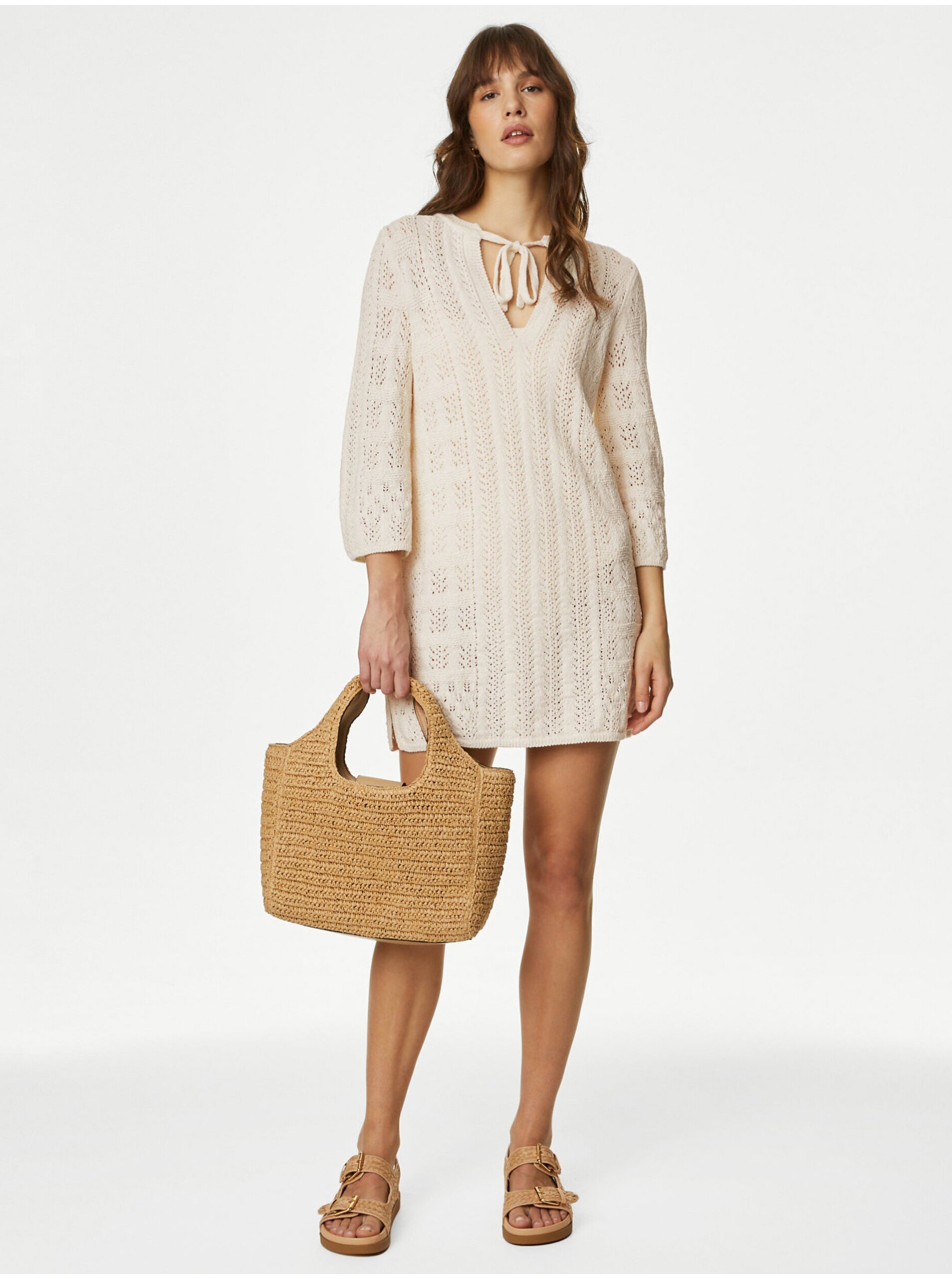 Levně Krémové dámské pletené šaty Marks & Spencer