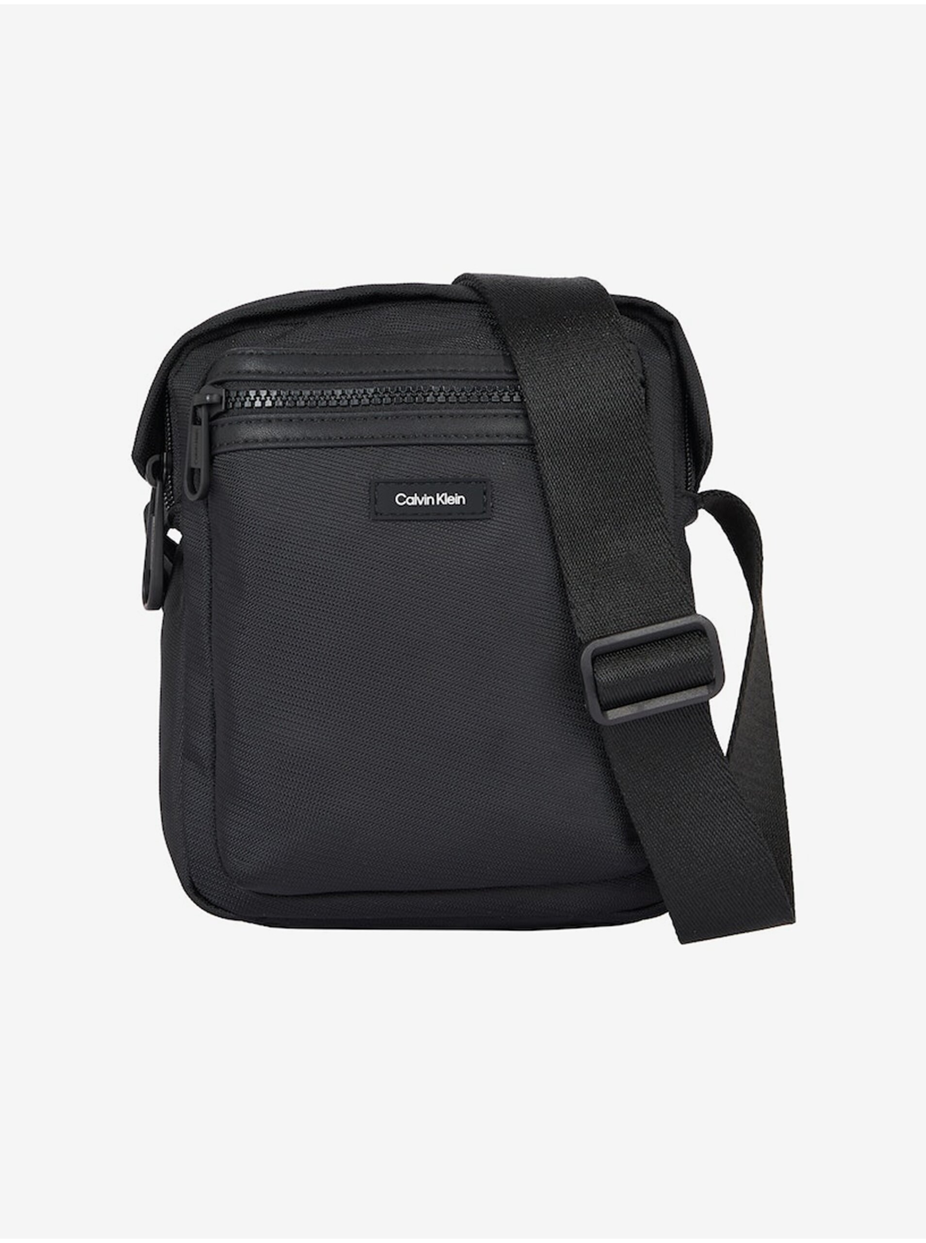 Levně Černá pánská taška přes rameno Calvin Klein Essential Reporter S