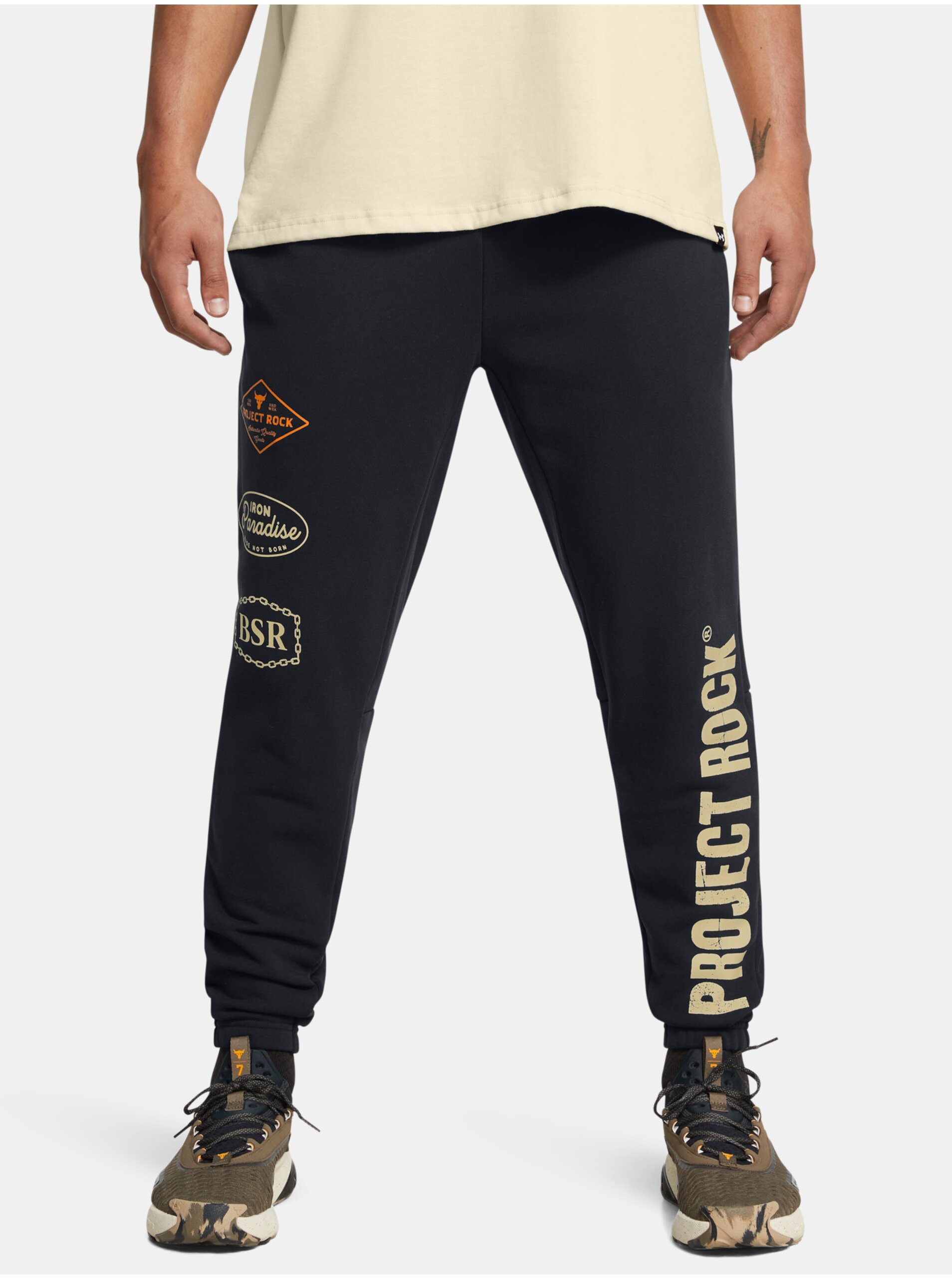 Levně Černé pánské sportovní kalhoty Under Armour Project Rock HWT Pant Tools
