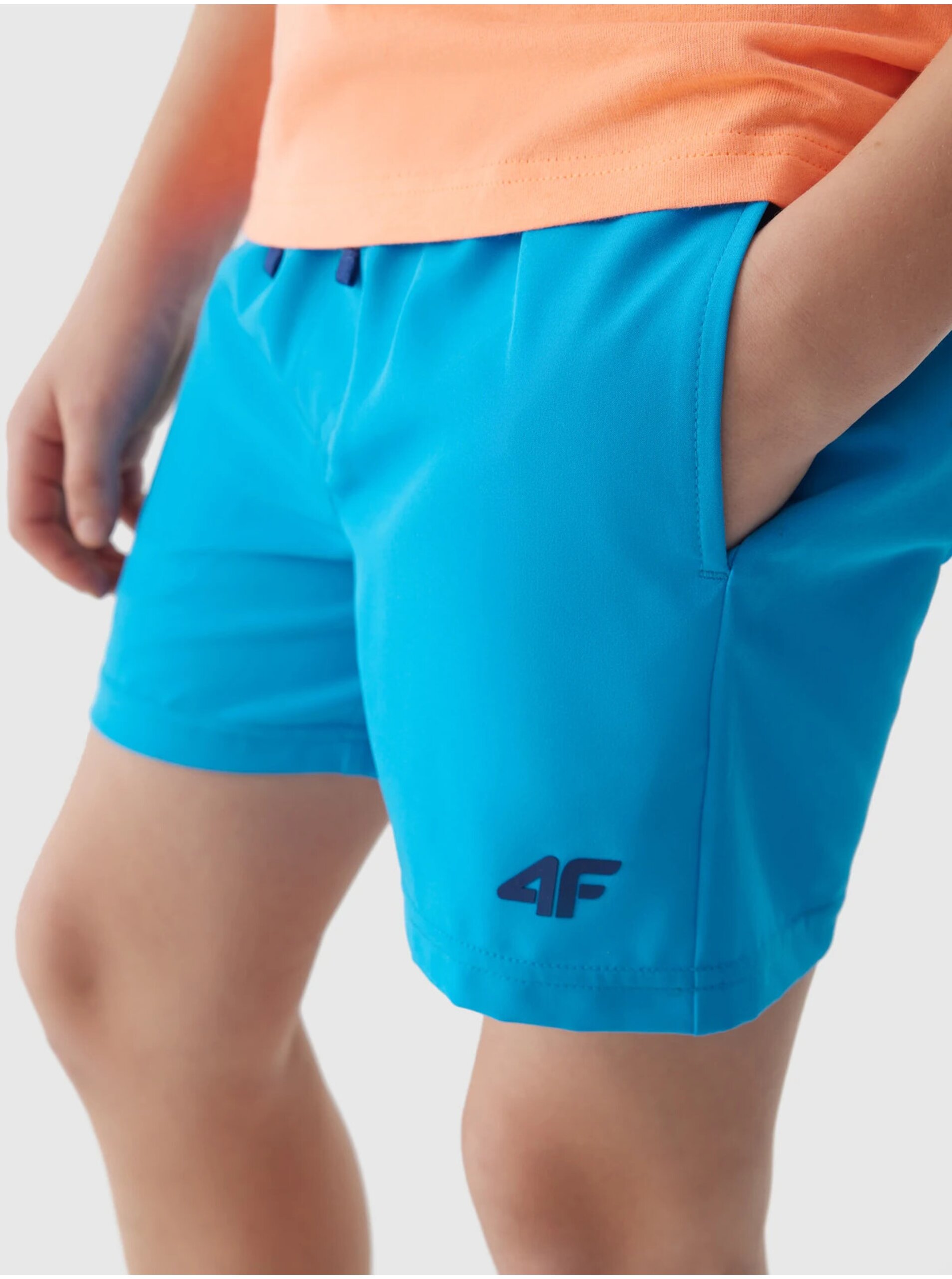 Levně Chlapecké plážové šortky typu boardshorts 4F - modré