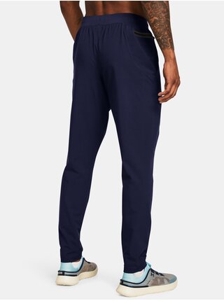 Tmavě modré sportovní kalhoty Under Armour UA UNSTOPPABLE TAPERED PANTS