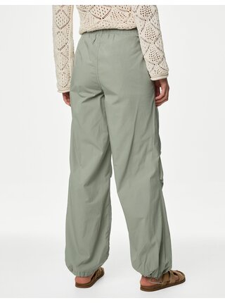Světle zelené dámské volné kalhoty Marks & Spencer 
