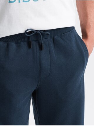 Tmavomodré pánske basic teplákové kraťasy Ombre Clothing